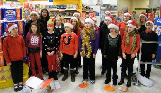 Photograph of Caithness And North Sutherland Children's Choir Sing Christmas songs At Tesco, Wick