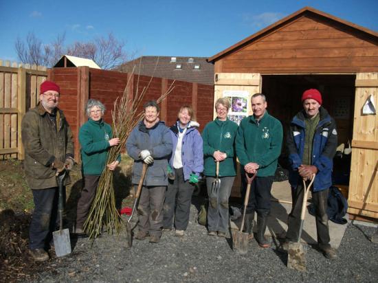 Photograph of Volunteers get to work planting for the future