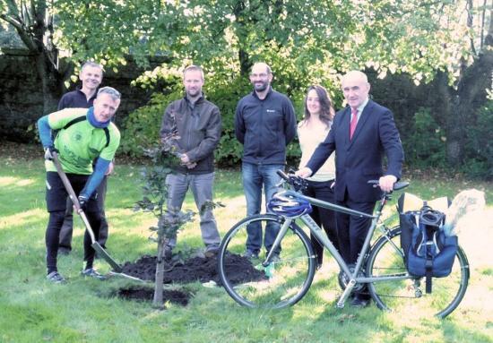 Photograph of Charity tree planting at The Highland Council