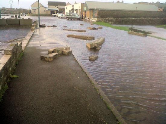 Photograph of Tidal wave causes damage to Thurso riverside wall