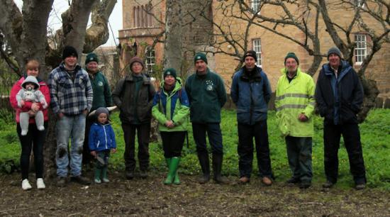 Photograph of Volunteers work in woodlands at Castle Mey