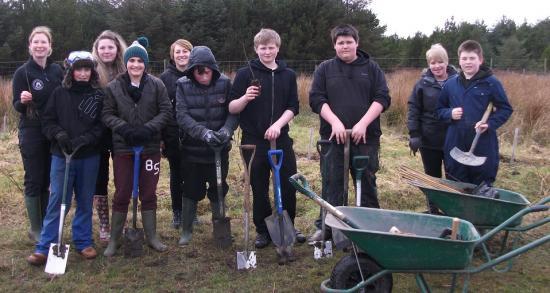 Photograph of Wick High School pupils get planting