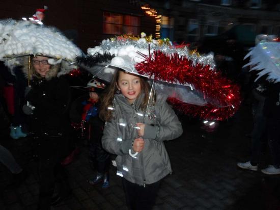 Photograph of Christmas Lights Switch on and Decorated Umbrella Parade in Wick