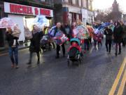 Thumbnail for article : Wick Christmas Lights Switch On Umbrella Parade