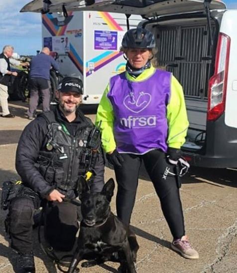 Photograph of Police Dog Tess enjoys retirement with owner Ian